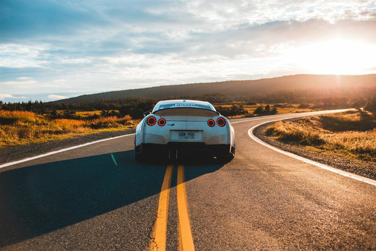 Car on the road representing auto insurance coverage in the USA